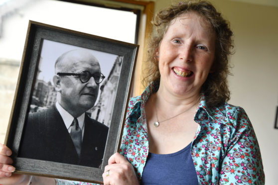 Jennie Milne with a photograph of her grandfather Stanislaw Lis, a Polish war hero.