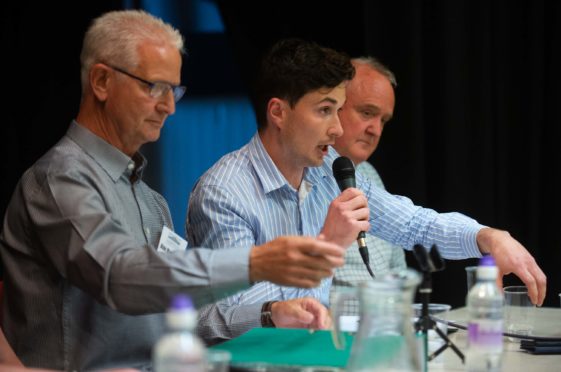 From left: Lossiemouth Community Development Trust;s Alan McDonald, Huw Williams and Rab Forbes at last night's footbridge public meeting