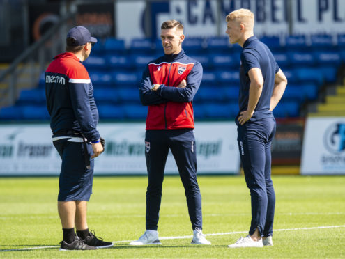 Ross County midfielder Josh Mullin (centre).