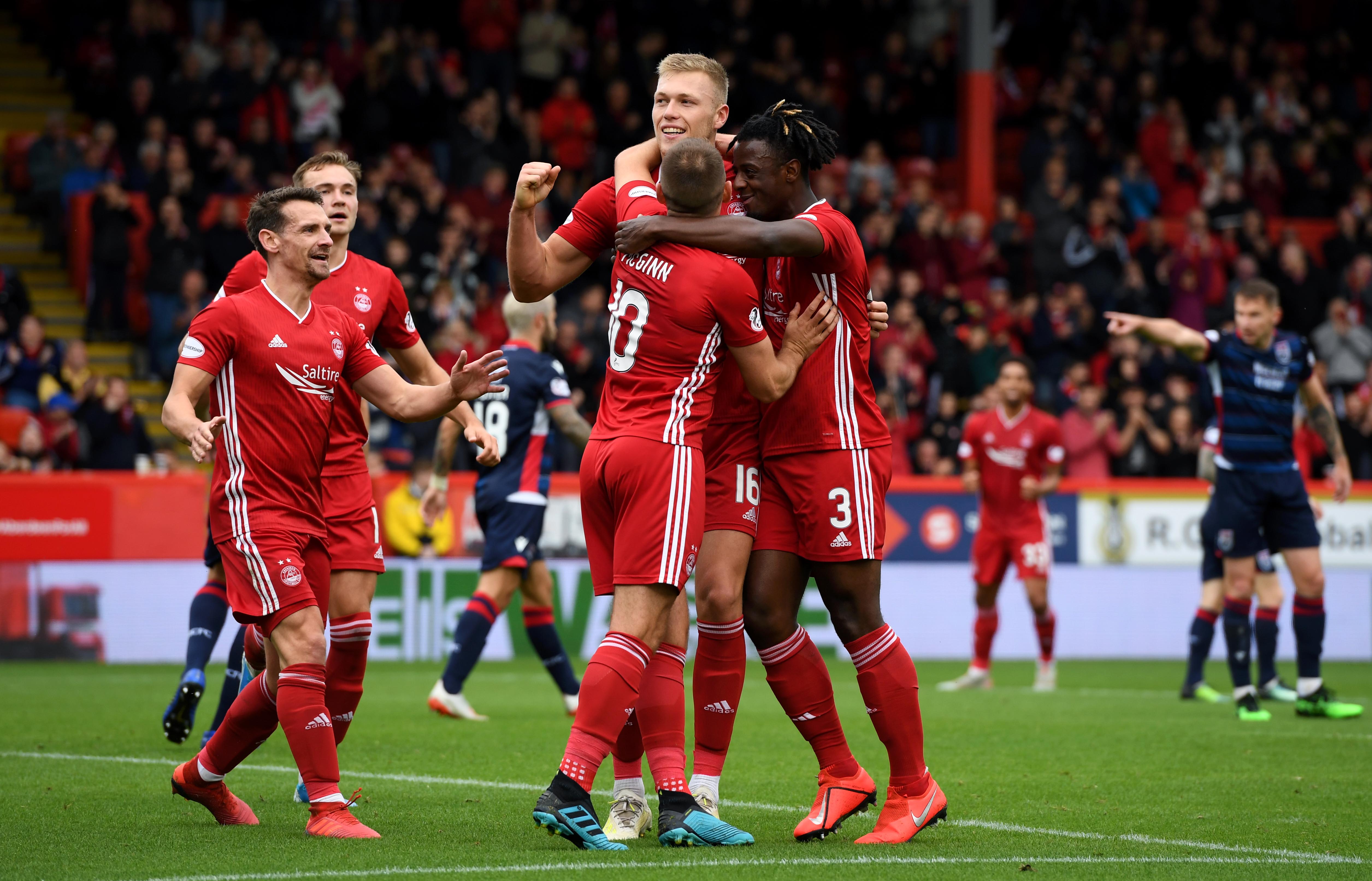 ABERDEEN, SCOTLAND - AUGUST 31: Aberdeen's Sam Cosgrove celebrates his goal during the Ladbrokes Premiership match between Aberdeen and Ross County at Pittodrie Stadium on August 31, 2019, in Aberdeen, Scotland (Photo by Craig Williamson / SNS Group)