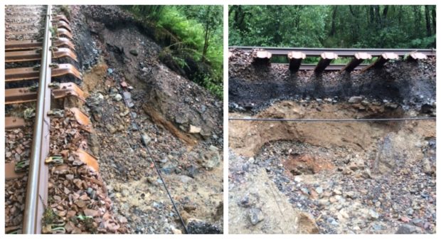 The rail line has been left exposed after a landslip.