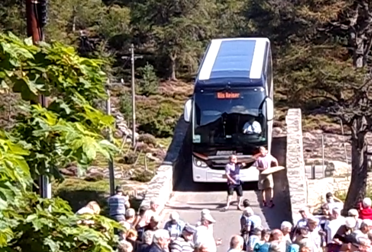 A hefty tourism bus going across Gairnshiel Bridge, which was originally built for horses.