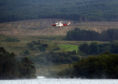 A coastguard helicopter scours Loch Awe.