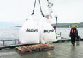 Bags of feed being loaded at Mowi’s new salmon feed plant at Kyleakin on Skye