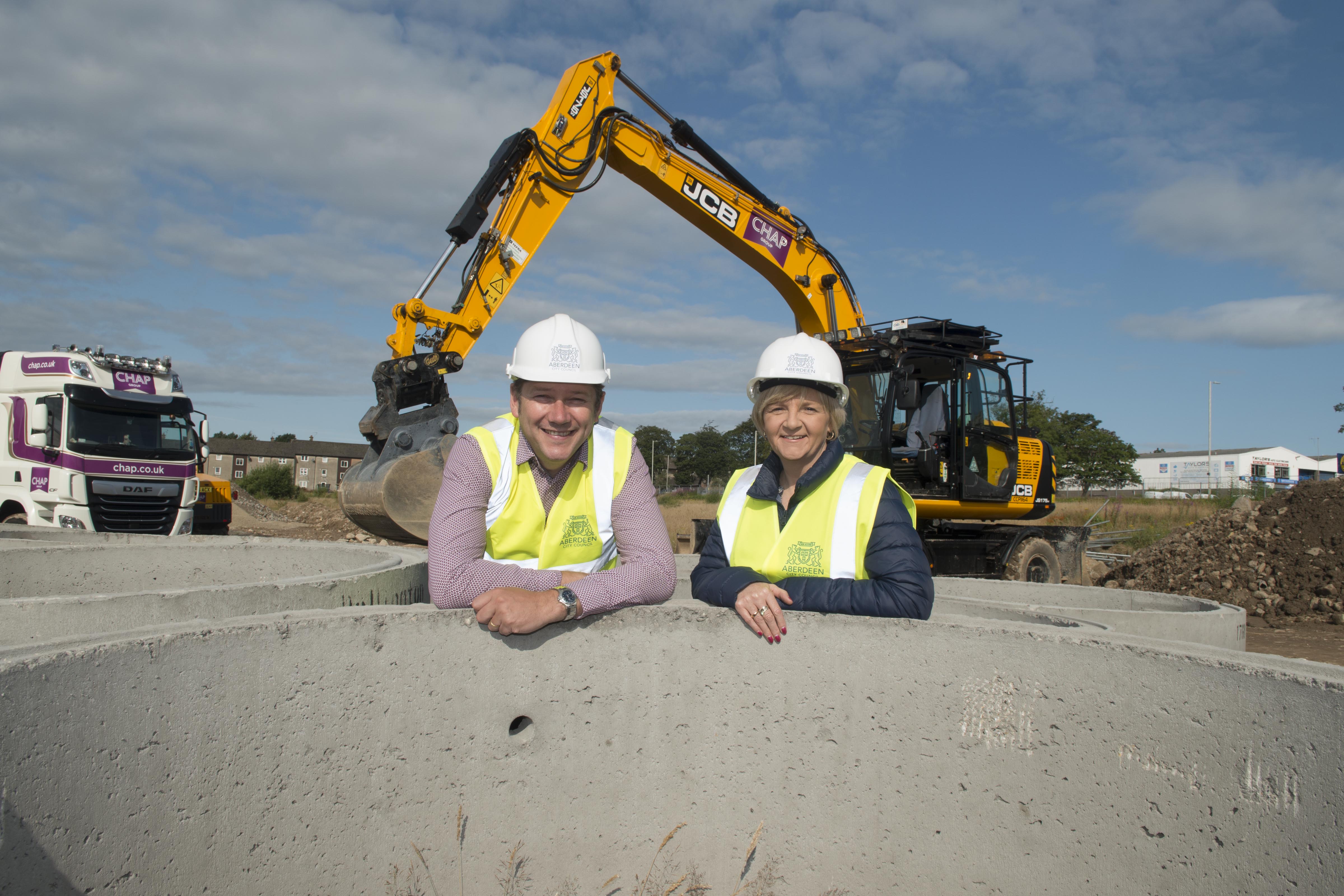 Council co-leaders Douglas Lumsden and Jenny Laing at the former Summerhill Academy site last August, as work started on 369 council houses.
