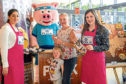 Customers Gillian Gove and daughter Billie Gray joined Aberdeenshire farmer Lynn Argo (far right) and one of the Specially Selected Pork brand ambassadors at Lidl in Aberdeen.