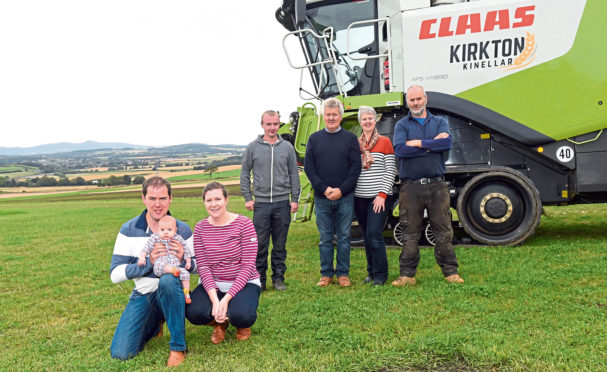Pictured from left, Scott Campbell, three-month-old son Blair and wife Elaine, Grant Cameron, worker, Iain and Lesley Campbell and Neil Campbell.