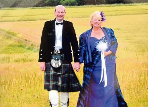 Angus and Caroline McNicol recreating their wedding photo 
Picture by DARRELL BENNS