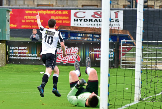 BROCH'S  SEAN BUTCHER TURNS TO CELEBRATE GOAL NO THREE