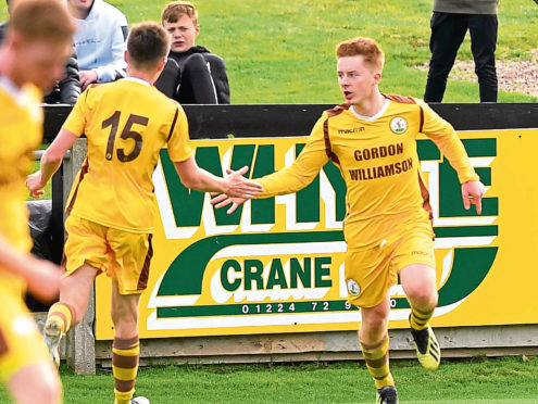 Macrae, right, in action for previous club Forres Mechanics.