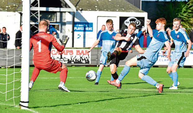 Wick's Jack Halliday fires ball past Turriff keeper Fraser Hobday
