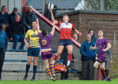 CR0013452
First round of the Scottish Cup - Aberdeen Grammar (red) v Marr RFC (purple) at Rubislaw.
Picture of Nathan Brown jumping for the ball.

Picture by KENNY ELRICK     31/08/2019