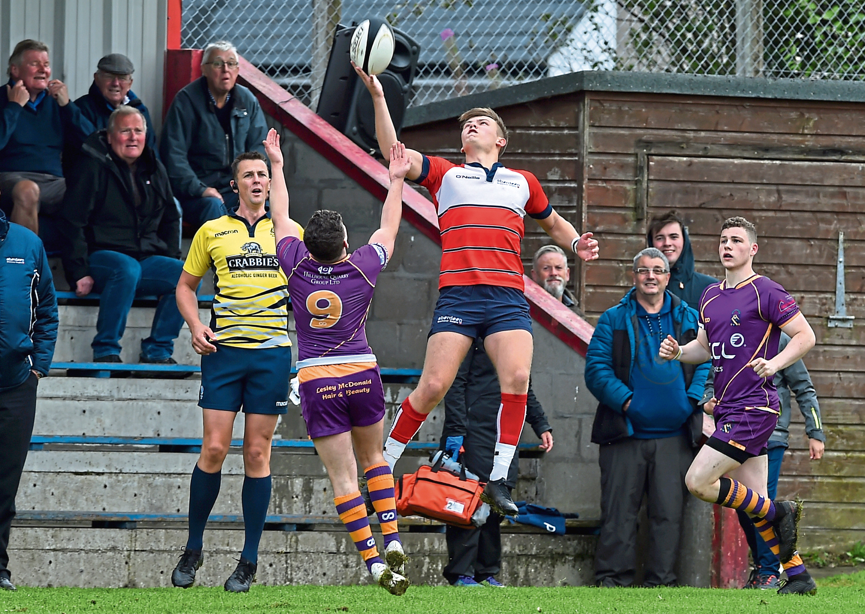 CR0013452
First round of the Scottish Cup - Aberdeen Grammar (red) v Marr RFC (purple) at Rubislaw.
Picture of Nathan Brown jumping for the ball.

Picture by KENNY ELRICK     31/08/2019