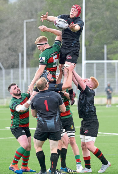 Oscar Baird for Highland tries to get this lineout ball but is beaten by Biggar. Picture by Sandy McCook