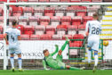 Caley thistle’s sean Welsh scores the only goal of the game at east end park to make it an away win