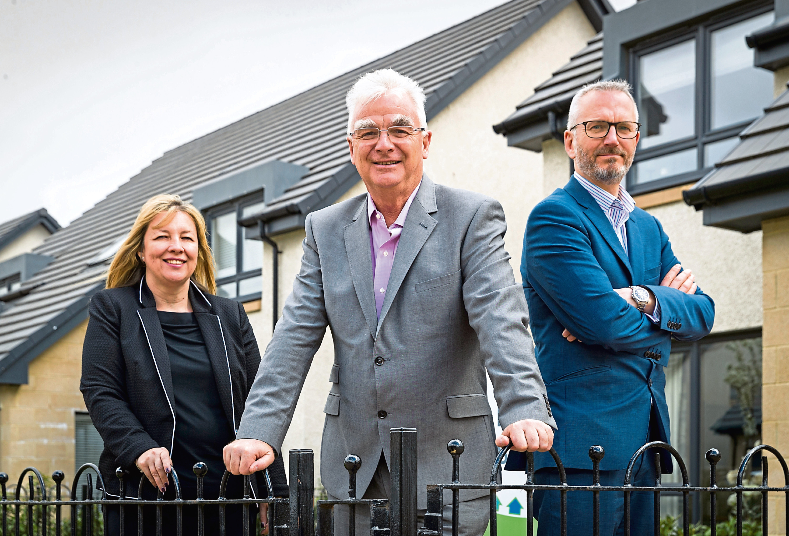 Springfield Homes board members Alexander Adam - Chairman, Innes Smith (beard) - Managing Director & Michelle Motion - Finance Director, photographed at the Springfield Homes development in Uddingston, near Glasgow on 20th April 2017.