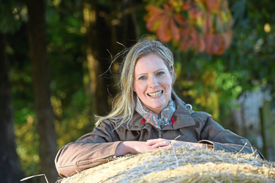 Picture by SANDY McCOOK  6th October '16

Press and Journal food writer and correspondent, Jo Mackenzie with her husband Nick and daughters Daisy and toddler Molly photographed on their Rootfield Farm.