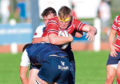 berdeen's Robin Cessford (L) in action with Selkirk's Derry Alexander during the Tennent's Premiership match between Selkirk and Aberdeen Grammar