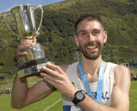 Finlay Wild celebrates his 10th consecutive win of the Ben Race.