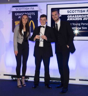 Matthew Sim accepting his award at the SFA Grassroots Awards 2019 at Hampden Park -Photo by Craig Foy / SNS Group)