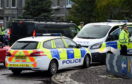 Emergency services at the scene of a crash at the Broomhill Road roundabout