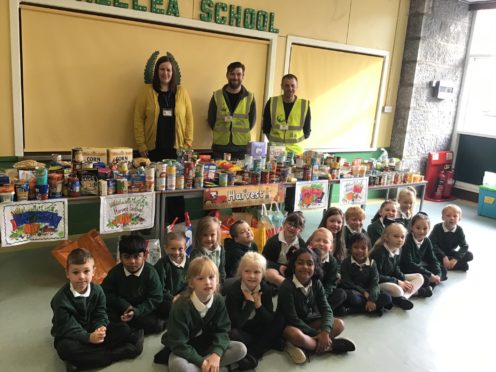 Primary two class and their donations.