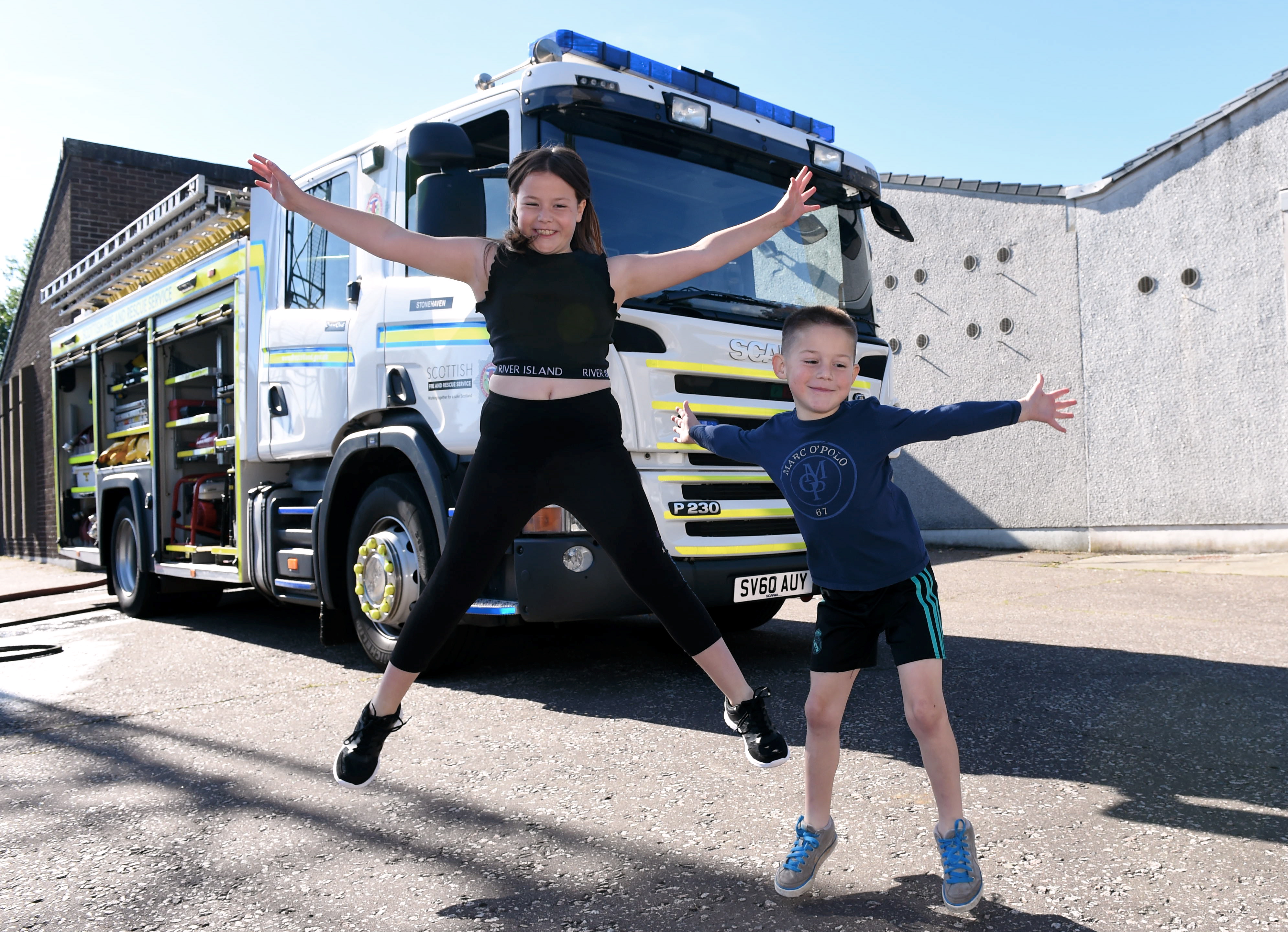 Olivia, 9 and Dexter Mitchell, 6 at Stonehaven community fire station.