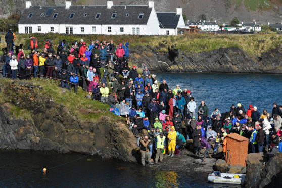 EASDALE, SCOTLAND - SEPTEMBER 25:  Competitors compete in the World Stone Skimming Championships, held on Easdale Island on September 29, 2013 in Easdale, Seil, Scotland. The championships are held on the last Sunday in September each year on Easdale, which is the smallest inhabited island of the Inner Hebrides.  (Photo by Jeff J Mitchell/Getty Images)