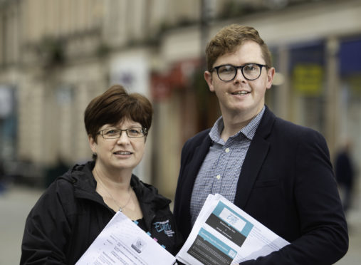 Elgin Bid chief executive Gill Neill and chairman Richard Cumming. Picture by Jason Hedges