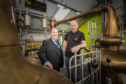 David Taylor, HIE account manager is pictured with Duncan Tait distillery manager at Glenwyvis Distillery.