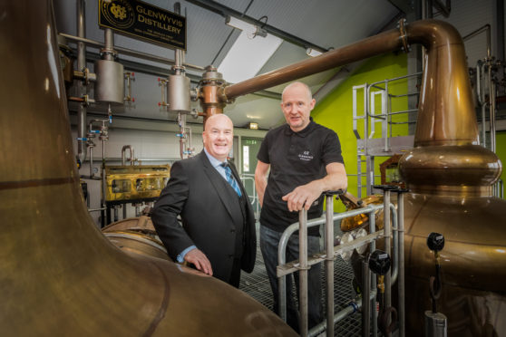 David Taylor, HIE account manager is pictured with Duncan Tait distillery manager at Glenwyvis Distillery.