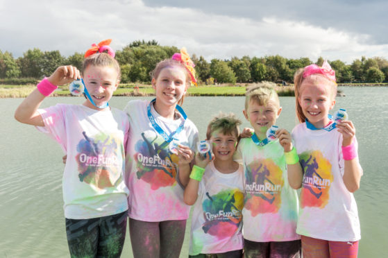 JDRF One Fun Run, participants with medals from last years run