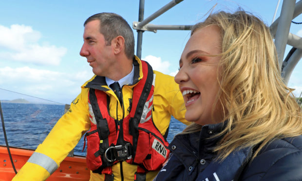 Kerrie at helm of Oban Lifeboat