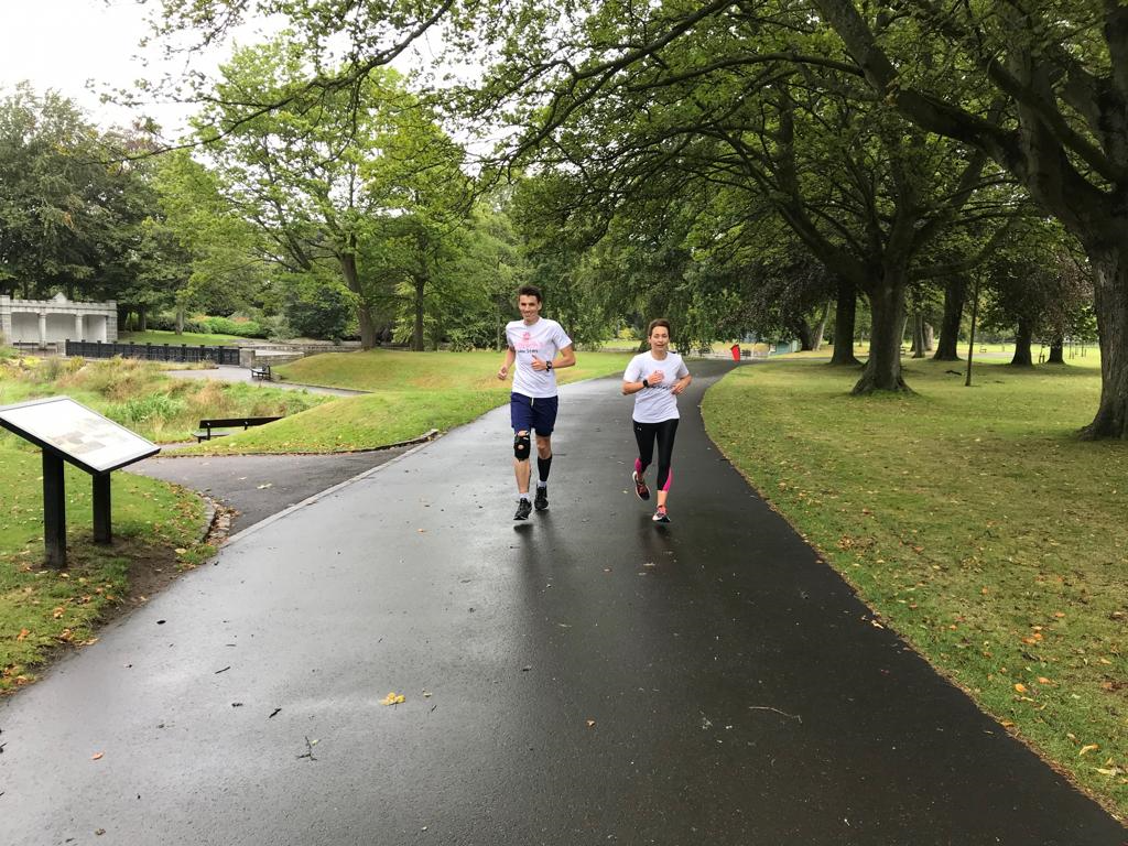 Matthew Milne and Tracey Morris, KWS charity manager, running the final miles.