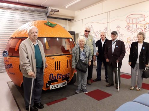 Veterans enjoying the museum visit.