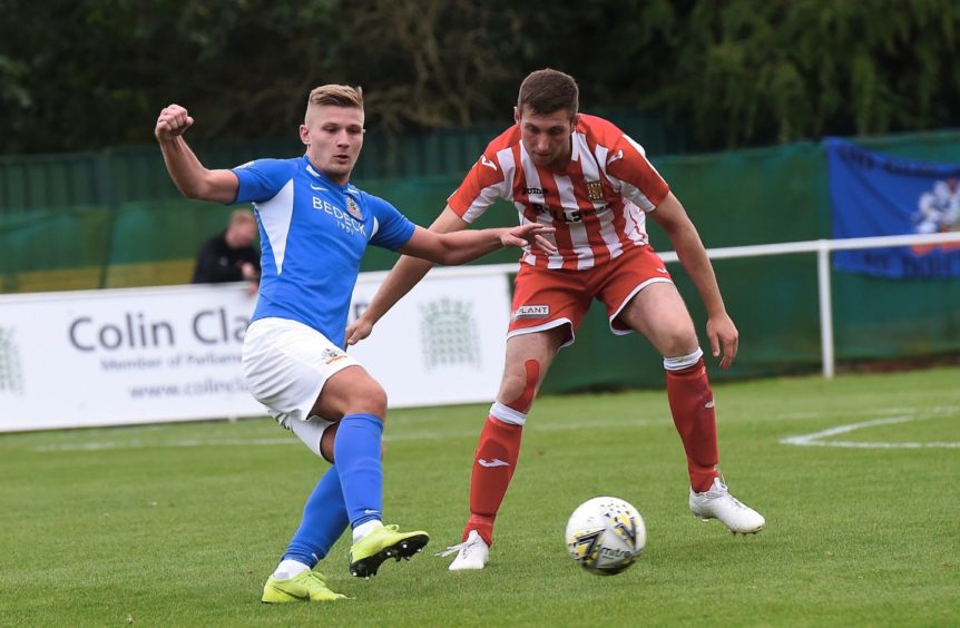 Formartine's Michael Clark and Glenavon's Andrew Mitchell.

Picture by HEATHER FOWLIE
