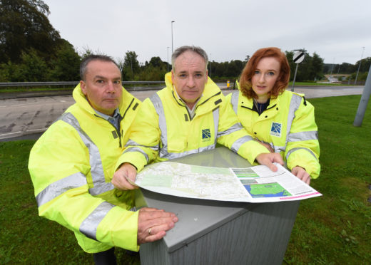 The upgraded A96 is expected to be completed by 2030. Pictured: Mott MacDonald Sweco's contract director Iain Scott, Moray MSP Richard Lochhead and Transport Scotland project manager Niamh Callaghan.