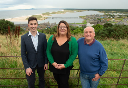 Huw Williams, development officer for Lossiemouth Community Development Trust, Moray Council convener Shona Morrison and Rab Forbes, chairman of Lossiemouth Community Development Trust's bridge committee.
