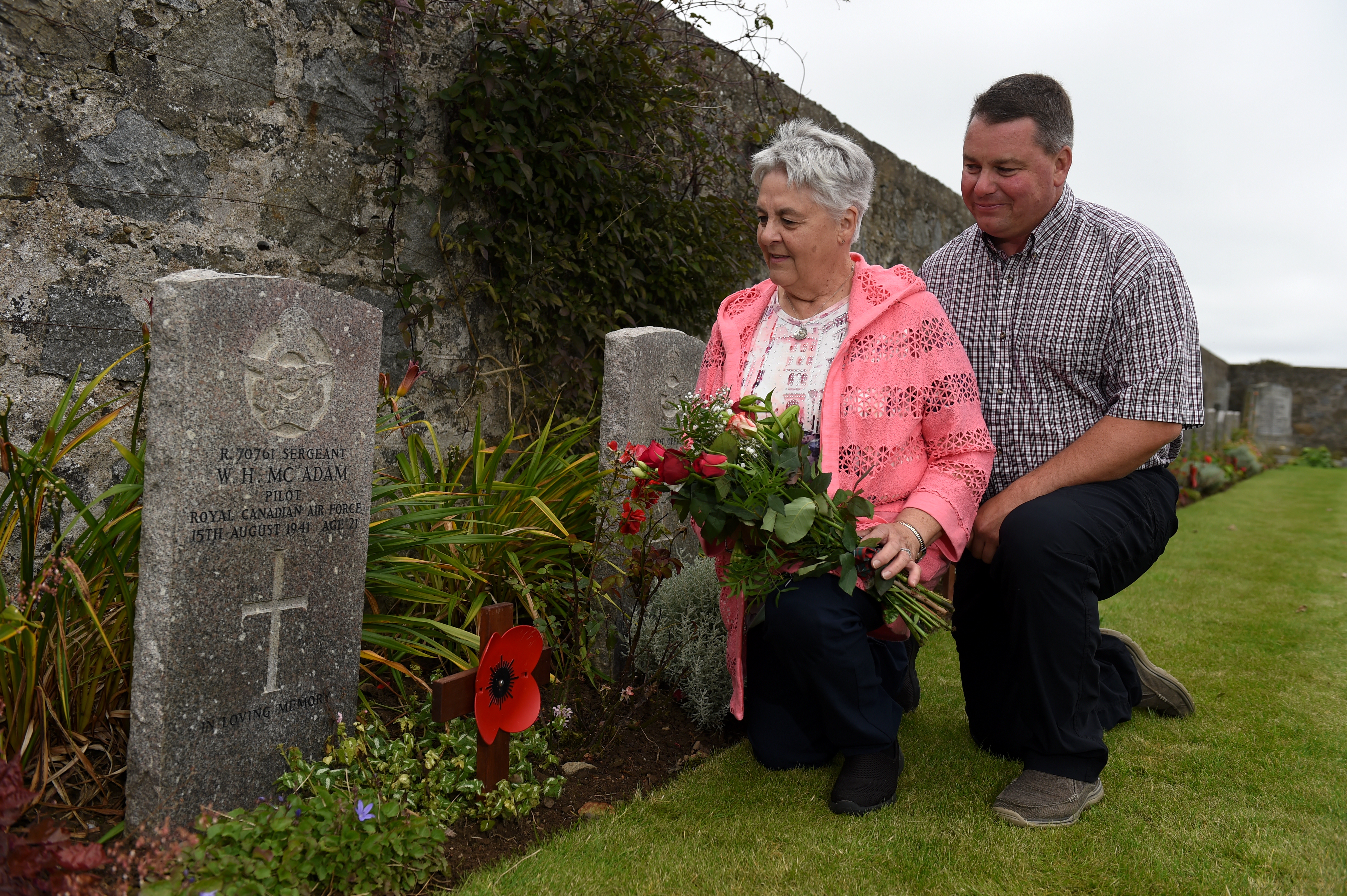 Louise Kurtz and son Jeffery Kurtz from Canada, visited the grave of her uncle who was sergeant Willaim McAdam, the first man to be killed flying over Peterhead in 1941 who is buried at Longside cemetery after crashing at a farm near Crimond. 

Picture by KENNY ELRICK     03/09/2019