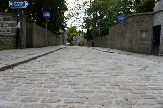 Newly repaired cobble stone road of Old Aberdeen's High Street.