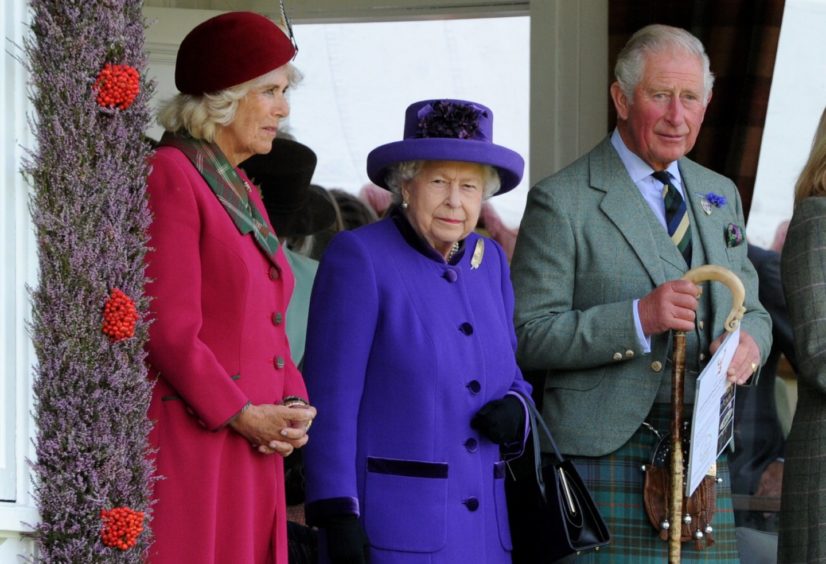 Picture of (L-R) Camilla Duchess of Rothesay, The Queen and Prince Charles watching the games.

Picture by KENNY ELRICK