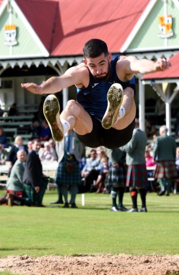 Andrew Murphy during the long jump.

Picture by KENNY ELRICK