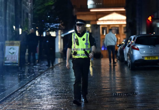 Sergeant Andy Sawers on Belmont Street.

Picture by KENNY ELRICK