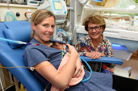 Mary Coughlin with Sophie Pizarro and twin boys.


Picture by KENNY ELRICK