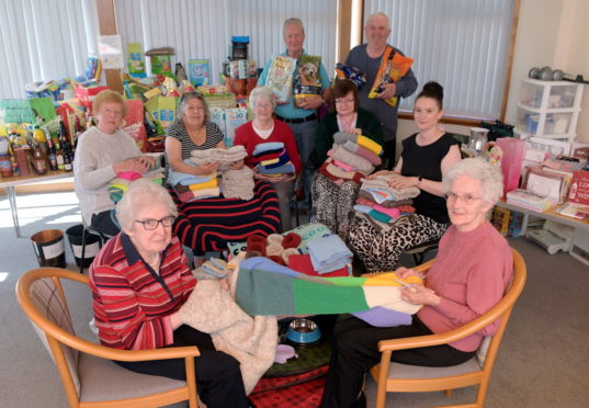 L-R: Margaret Kerr and Margaret Bremner, with  Peggy Dinverno, Chris Duguid, Alice Cunningham, Kenny Wallace, Joan Watson, Kenny Johnston and Sheltered Housing Officer Rosa-Lynn Bruce.