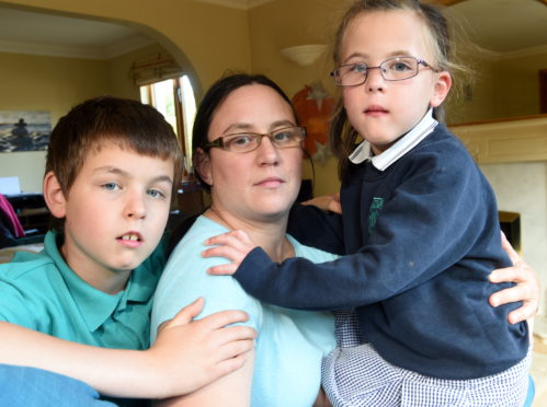 Susan Crookes of Evanton with her children Benjamin and Hannah. Picture by Sandy McCook.