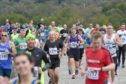 Runners during last year's Loch Ness Marathon. Picture by Sandy McCook.