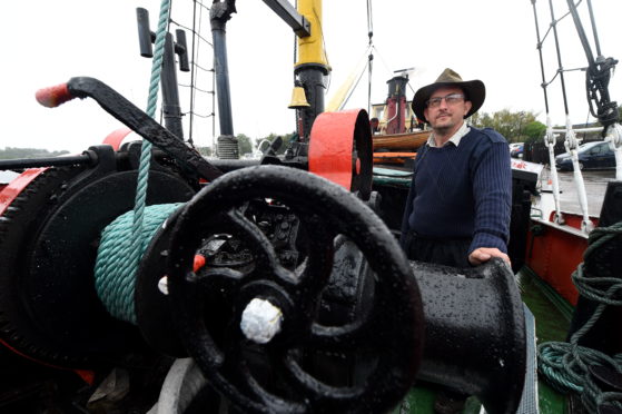 First Mate Jim Hay aboard the VIC 32.  Picture by Sandy McCook