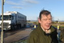 Campaigner Michael Baird at the northern junction from the A9 to Tain, where a roundabout could be introduced. Picture by Sandy McCook