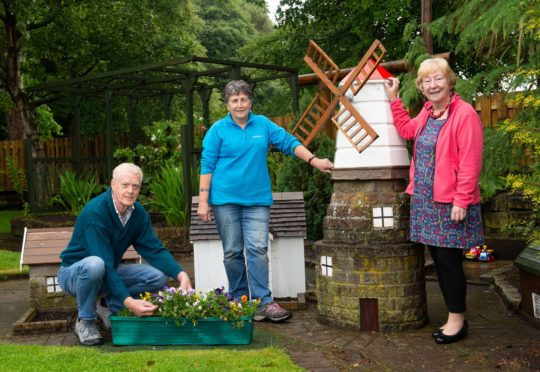 Forres in Bloom won three prizes at the Beautiful Scotland awards. Pictured: Treasurer John Marshall, chairwoman Diane McGregor, secretary Sandra Maclennan.